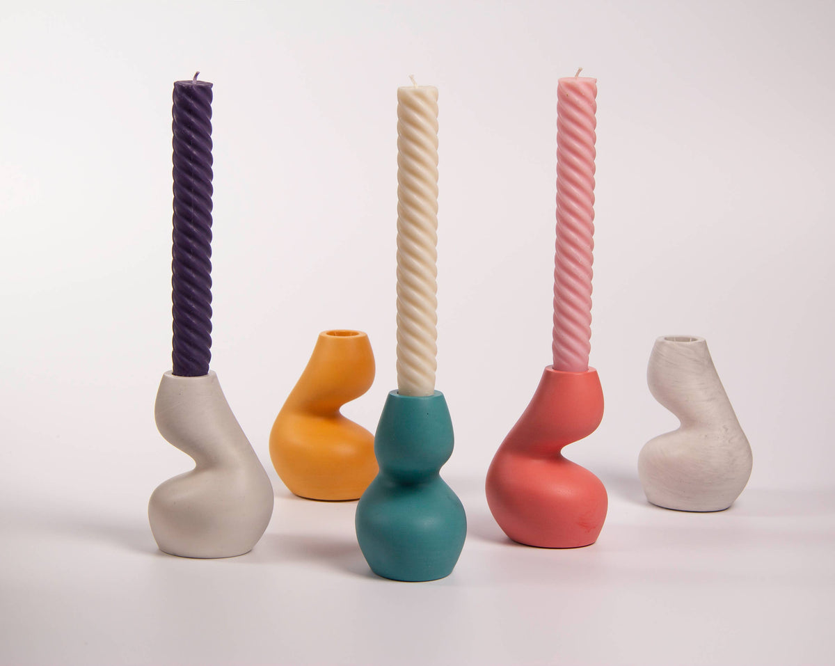 Gravity sculptural candle holder